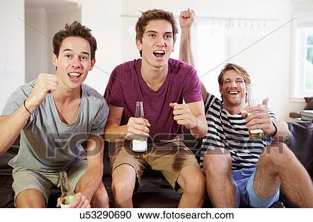 Friends Watching Sport Celebrating Goal View Large Photo Image Stock Image - Friends Watching Sport Celebrating Goal. Fotosearch