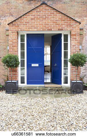 Stock Image - Front Door Of Modern House. Fotosearch