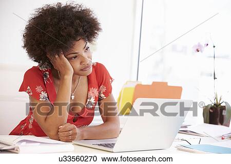 Frustrated Woman Working At Desk In Design Studio View Large Photo Image Stock Image - Frustrated Woman Working At Desk In Design Studio . Fotosearch