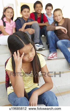 Girl being bullied in school View Large Photo Image Stock Image - Girl being bullied in school. Fotosearch