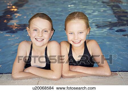 Picture - Girls in swimming pool. Fotosearch
