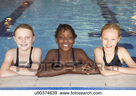 Girls in swimming pool View Large Photo Image Stock Photo - Girls in swimming pool. Fotosearch