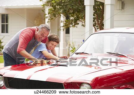 Grandfather And Grandson Cleaning Restored Classic Car View Large Photo Image Stock Photo - Grandfather And Grandson Cleaning Restored Classic Car. Fotosearch