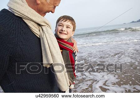 Grandfather And Grandson Walking On Winter Beach View Large Photo Image Stock Image - Grandfather And Grandson Walking On Winter Beach. Fotosearch