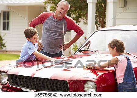 Grandfather With Grandchildren Cleaning Restored Classic Car View Large Photo Image Stock Image - Grandfather With Grandchildren Cleaning Restored Classic Car. Fotosearch