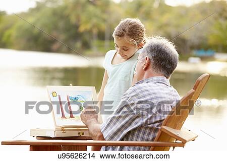Grandfather With Granddaughter Outdoors Painting Landscape View Large Photo Image Picture - Grandfather With Granddaughter Outdoors Painting Landscape. Fotosearch