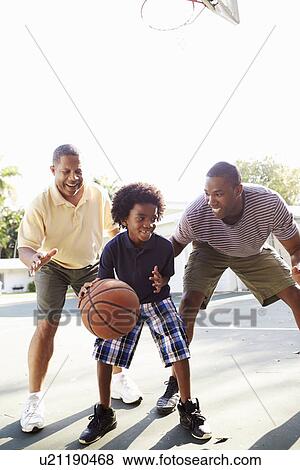 Stock Photo - Grandfather With Son And Grandson Playing Basketball. Fotosearch