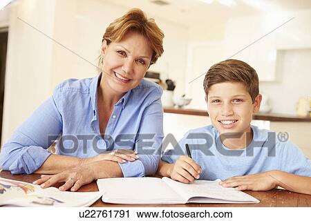 Grandmother Helping Grandson With Homework View Large Photo Image Stock Image - Grandmother Helping Grandson With Homework . Fotosearch