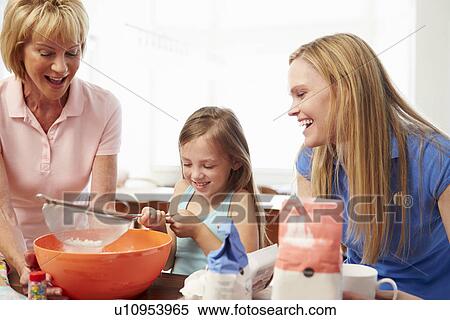 Grandmother With Granddaughter And Mother Baking Together View Large Photo Image Stock Photography - Grandmother With Granddaughter And Mother Baking Together . Fotosearch