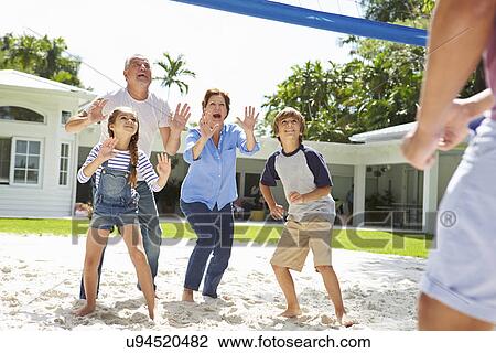 Grandparents And Grandchildren Playing Volleyball In Garden View Large Photo Image Stock Image - Grandparents And Grandchildren Playing Volleyball In Garden . Fotosearch
