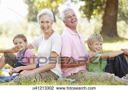 Grandparents with grandchildren in the country View Large Photo Image Stock Image - Grandparents with grandchildren in the country. Fotosearch