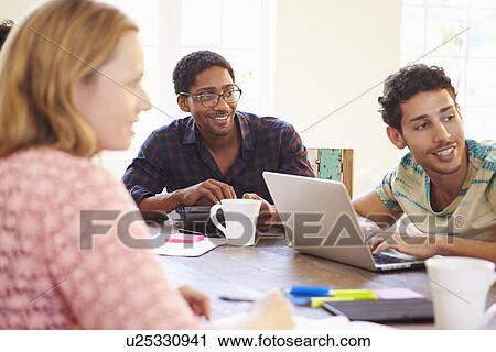 Group Of Business People Sitting Around Table In Meeting View Large Photo Image Stock Image - Group Of Business People Sitting Around Table In Meeting. Fotosearch