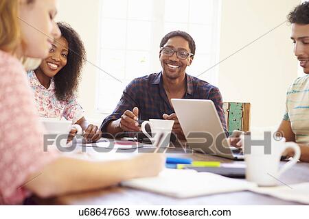Group Of Business People Sitting Around Table In Meeting View Large Photo Image Stock Image - Group Of Business People Sitting Around Table In Meeting. Fotosearch