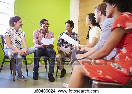 Picture - Group Of Designers Meeting To Discuss New Ideas. Fotosearch