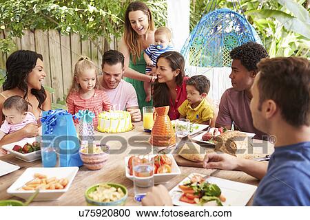 Group Of Families Celebrating Child's Birthday At Home View Large Photo Image Stock Image - Group Of Families Celebrating Child's Birthday At Home. Fotosearch