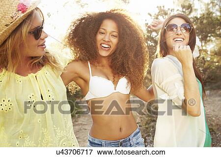 Group Of Female Friends Having Party On Beach Together View Large Photo Image Stock Photo - Group Of Female Friends Having Party On Beach Together. Fotosearch