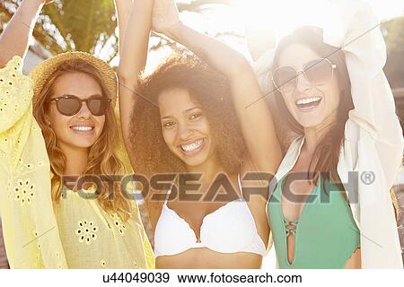 Group Of Female Friends Having Party On Beach Together View Large Photo Image Stock Photo - Group Of Female Friends Having Party On Beach Together. Fotosearch