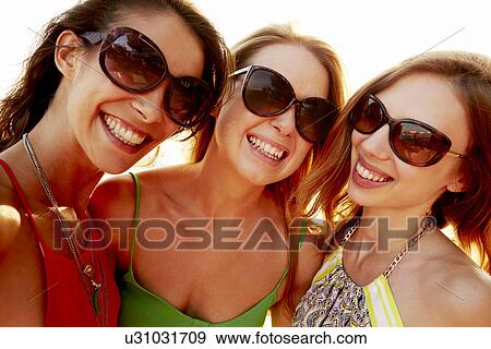 Group Of Female Friends On Summer Holiday Together View Large Photo Image Stock Photo - Group Of Female Friends On Summer Holiday Together . Fotosearch