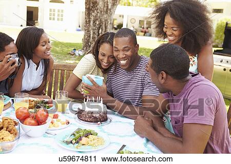 Group Of Friends Celebrating Birthday At Home View Large Photo Image Stock Image - Group Of Friends Celebrating Birthday At Home. Fotosearch
