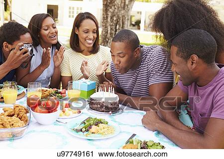Group Of Friends Celebrating Birthday At Home View Large Photo Image Stock Image - Group Of Friends Celebrating Birthday At Home. Fotosearch