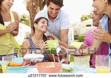 Group Of Friends Celebrating Birthday At Home View Large Photo Image Stock Photo - Group Of Friends Celebrating Birthday At Home. Fotosearch