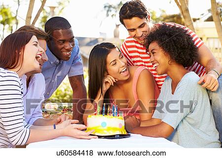 Group Of Friends Celebrating Birthday Outdoors View Large Photo Image Stock Photo - Group Of Friends Celebrating Birthday Outdoors. Fotosearch