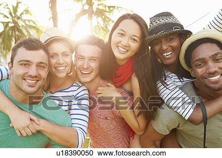 Group Of Friends Having Fun In Park Together View Large Photo Image Stock Image - Group Of Friends Having Fun In Park Together. Fotosearch