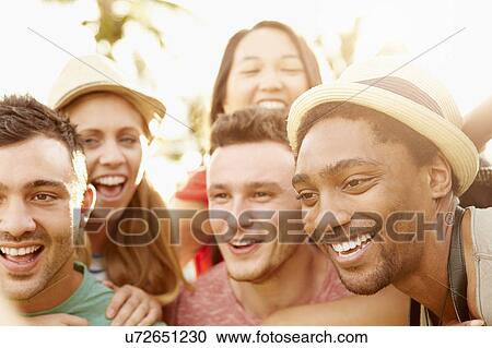 Group Of Friends Having Fun In Park Together View Large Photo Image Stock Image - Group Of Friends Having Fun In Park Together. Fotosearch