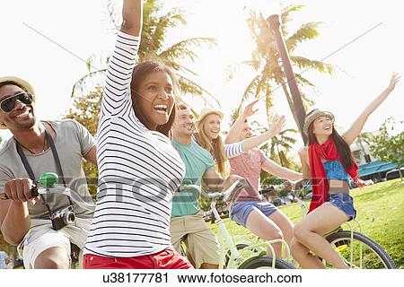 Group Of Friends Having Fun On Bicycle Ride View Large Photo Image Stock Image - Group Of Friends Having Fun On Bicycle Ride. Fotosearch