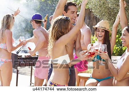 Group Of Friends Having Party By Swimming Pool View Large Photo Image Picture - Group Of Friends Having Party By Swimming Pool. Fotosearch