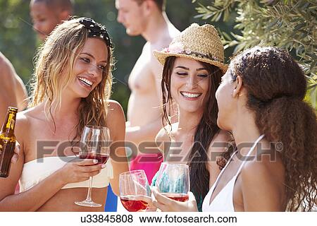 Group Of Friends Having Party By Swimming Pool View Large Photo Image Stock Photo - Group Of Friends Having Party By Swimming Pool. Fotosearch