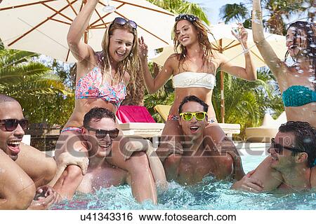 Group Of Friends Having Party In Pool Drinking Champagne View Large Photo Image Stock Photograph - Group Of Friends Having Party In Pool Drinking Champagne. Fotosearch