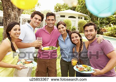 Group Of Friends Having Party In Backyard At Home View Large Photo Image Stock Photo - Group Of Friends Having Party In Backyard At Home. Fotosearch