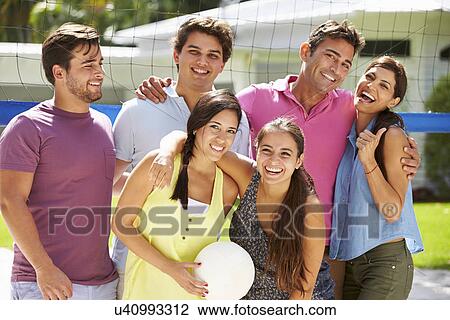 Group Of Friends Playing Volleyball In Garden View Large Photo Image Stock Image - Group Of Friends Playing Volleyball In Garden . Fotosearch
