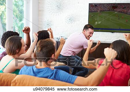 Group Of Friends Watching Soccer Celebrating Goal View Large Photo Image Stock Photography - Group Of Friends Watching Soccer Celebrating Goal. Fotosearch