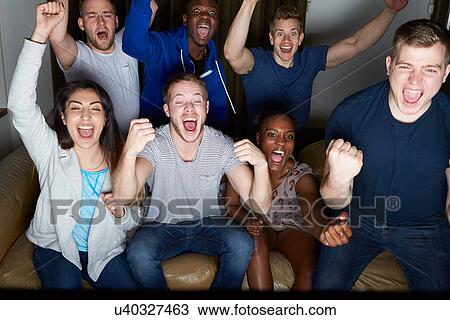 Group Of Friends Watching Television At Home Together View Large Photo Image Stock Image - Group Of Friends Watching Television At Home Together. Fotosearch