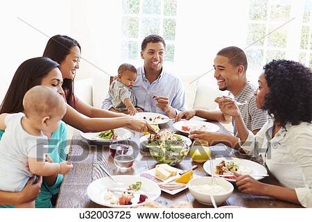 Group Of Friends With Babies Enjoying Meal At Home Together View Large Photo Image Stock Photography - Group Of Friends With Babies Enjoying Meal At Home Together. Fotosearch