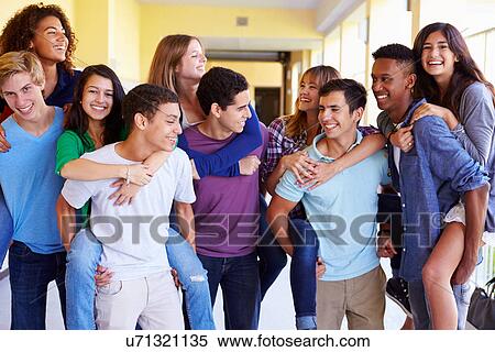 Group Of High School Students Giving Piggybacks In Corridor View Large Photo Image Stock Photography - Group Of High School Students Giving Piggybacks In Corridor. Fotosearch