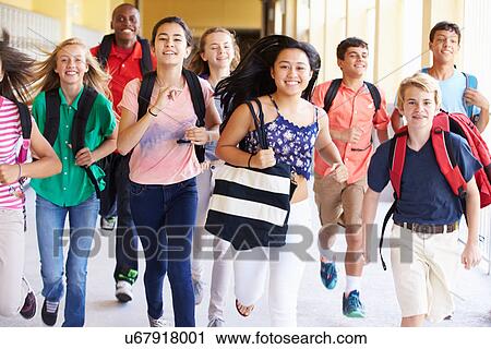 Group Of High School Students Running Along Corridor View Large Photo Image Stock Image - Group Of High School Students Running Along Corridor. Fotosearch