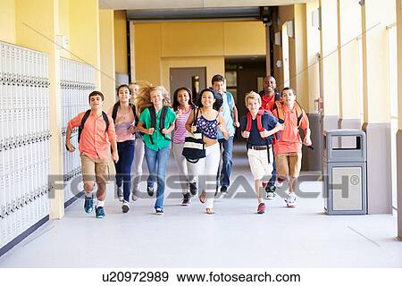 Group Of High School Students Running Along Corridor View Large Photo Image Stock Photo - Group Of High School Students Running Along Corridor. Fotosearch