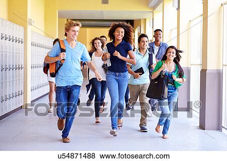 Group Of High School Students Running In Corridor View Large Photo Image Stock Photo - Group Of High School Students Running In Corridor. Fotosearch