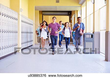 Group Of High School Students Running In Corridor View Large Photo Image Stock Photograph - Group Of High School Students Running In Corridor. Fotosearch