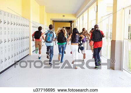 Group Of High School Students Running Along Corridor View Large Photo Image Stock Photography - Group Of High School Students Running Along Corridor. Fotosearch