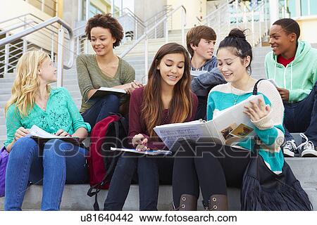 Group Of High School Students Sitting Outside Building View Large Photo Image Stock Image - Group Of High School Students Sitting Outside Building. Fotosearch