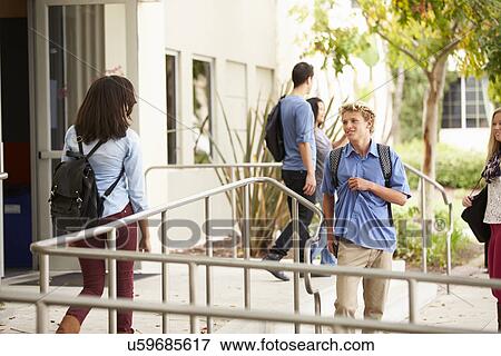 Stock Photo - Group Of High School Students Standing Outside Building. Fotosearch