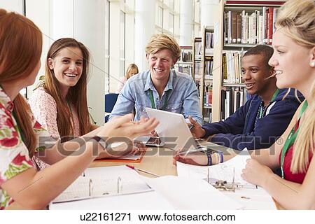 Group Of Students Working Together In Library View Large Photo Image Stock Image - Group Of Students Working Together In Library. Fotosearch