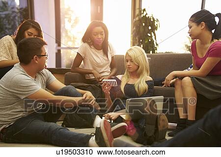 Group Of University Students Relaxing In Common Room View Large Photo Image Stock Image - Group Of University Students Relaxing In Common Room. Fotosearch