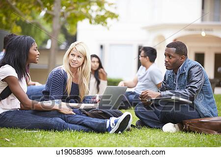 Group Of University Students Working Outside Together View Large Photo Image Stock Photography - Group Of University Students Working Outside Together. Fotosearch