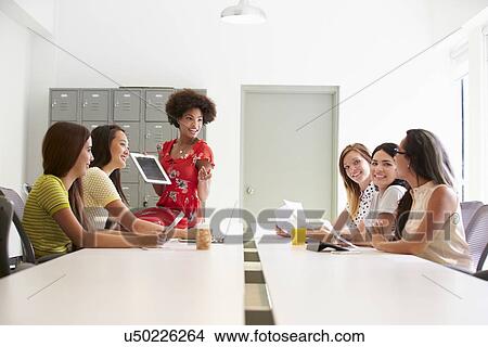 Group Of Women Working Together In Design Studio View Large Photo Image Picture - Group Of Women Working Together In Design Studio. Fotosearch