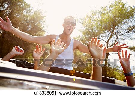 Group Of Young Friends Dancing In Back Of Open Top Car View Large Photo Image Stock Image - Group Of Young Friends Dancing In Back Of Open Top Car. Fotosearch